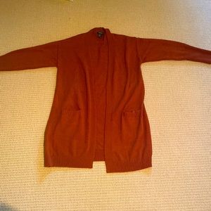 Rust orange cardigan with pockets size large